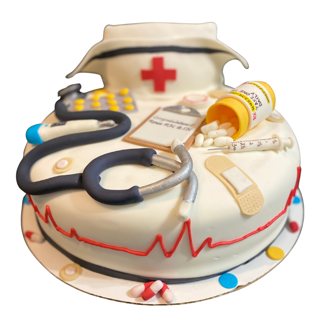White fondant cake decorated with a nurse's cap, stethoscope and heartbeat line