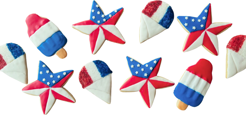 Fourth of July cookies shaped like stars, rocket pops and snow cones