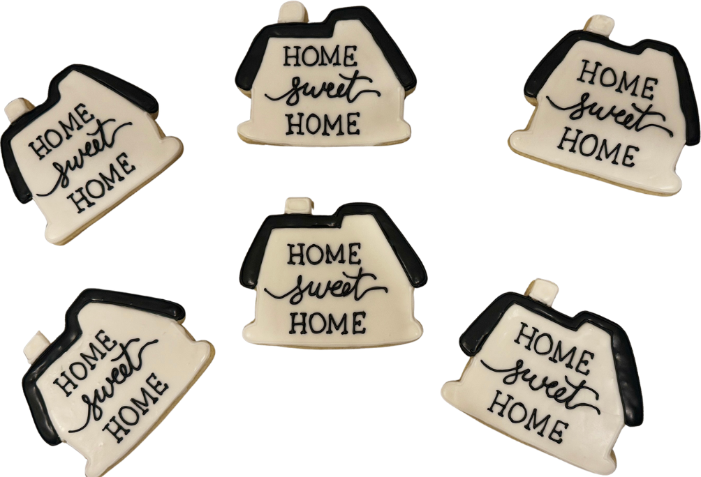 Housewarming cookies shaped like houses reading Home Sweet Home