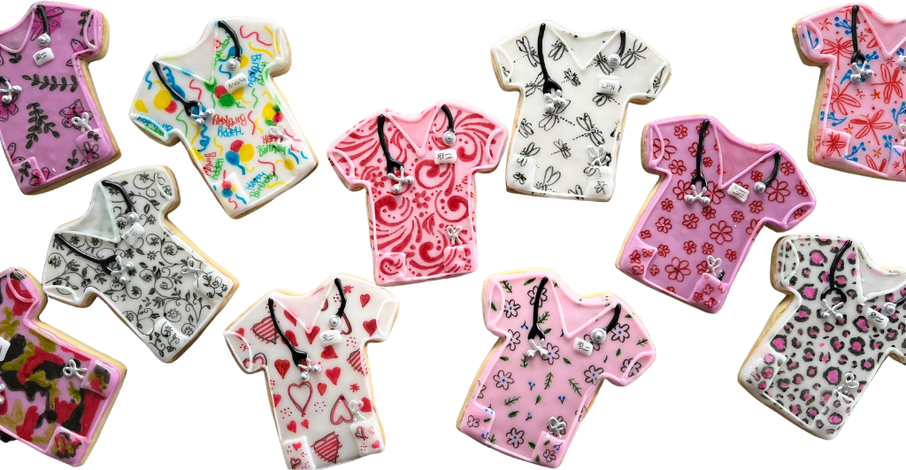 Cookies shaped like nurse scrub tops in florals, hearts and animal print with stethoscopes